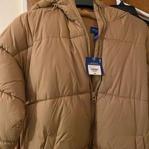Brand new puffer long coat. Arizona brand.